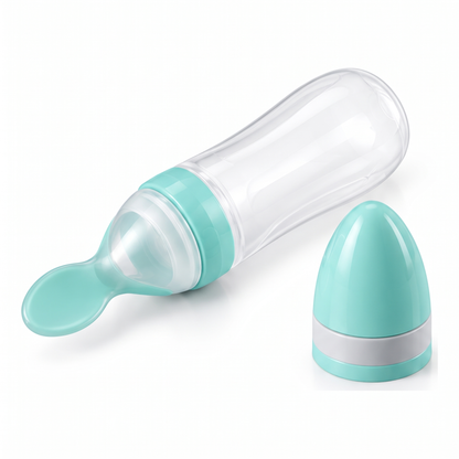 NibbliBaby squeeze spoon feeder with its protective cap